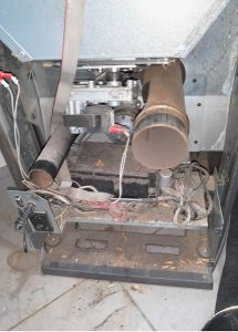 Photo moteur poêle granulés EDILKAMIN avant nettoyage_2